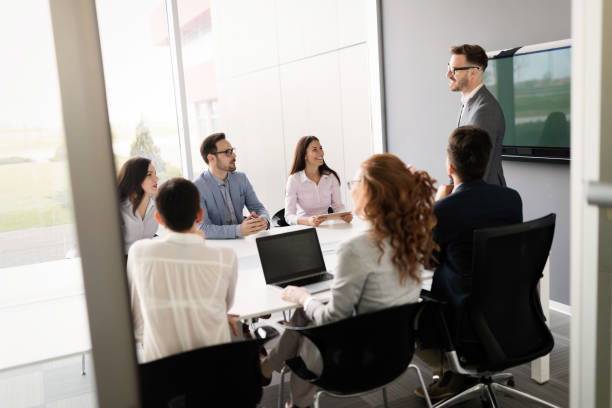 istock Business colleagues in conference room working together 1139870502