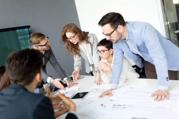 istock Business colleagues in conference room working together 1139870559