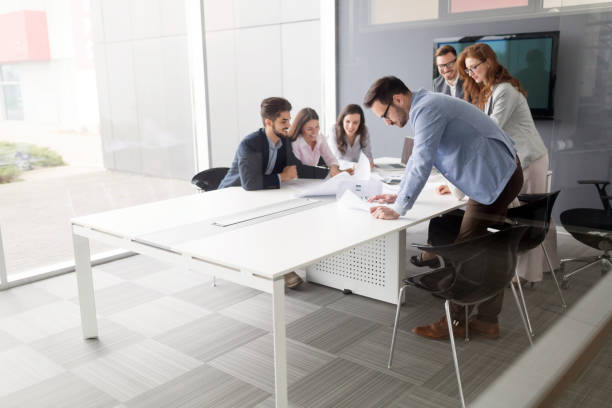 istock Business colleagues in conference room working together 1139870560