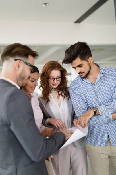 istock Group of business people collaborating in office 1139870572