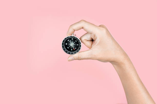 istock Hand holding compass In the travel concept 1139870758