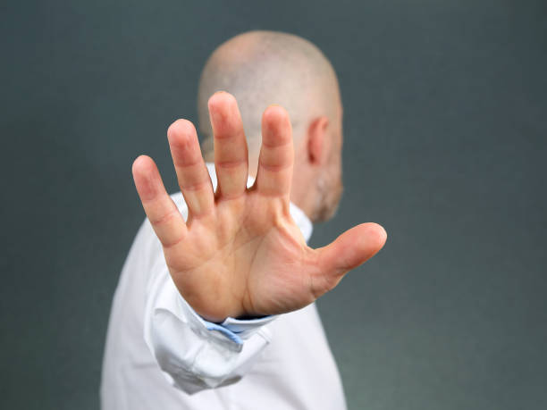 istock man negative hand gesture and turned away 1139871088