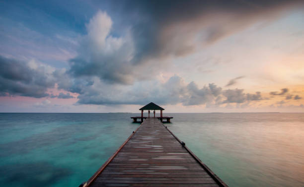 istock Maldives Pier Spectacular Sunrise 1139872257