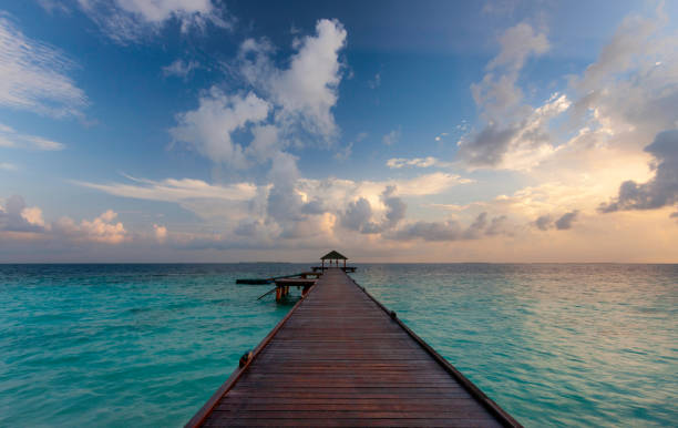 istock Maldives Pier Spectacular Sunrise 1139872286