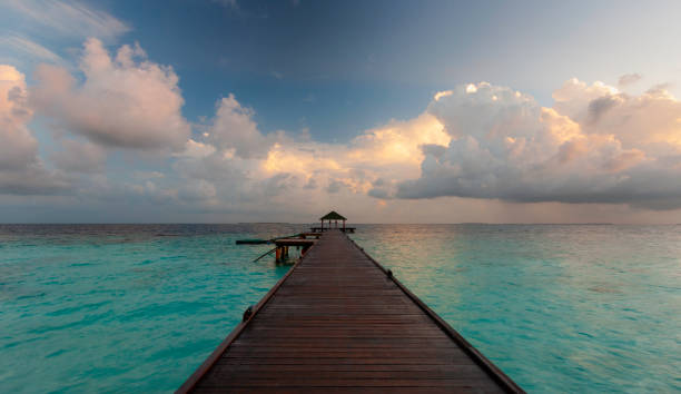 istock Maldives Pier Spectacular Sunrise 1139872347