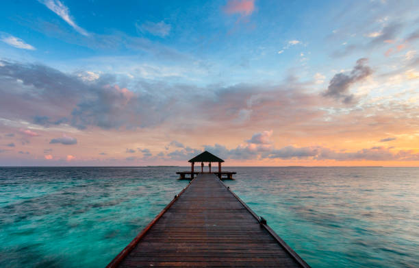 istock Maldives Pier Spectacular Sunrise 1139872361