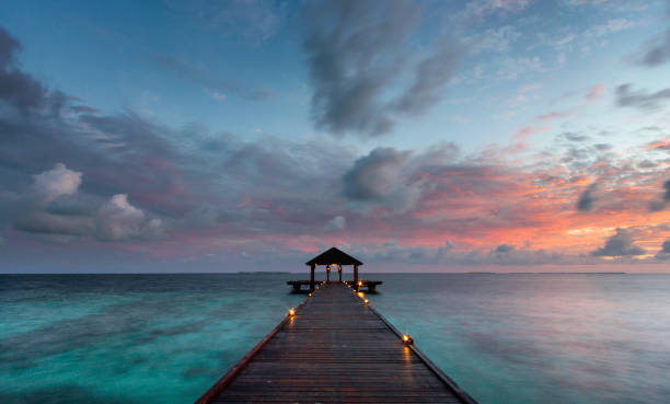 istock Maldives Pier Spectacular Sunrise 1139872462