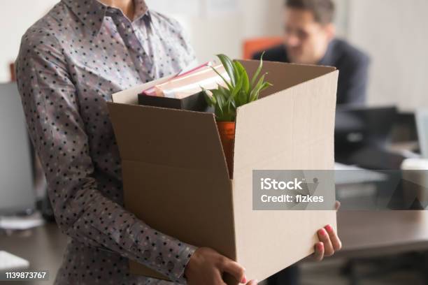 Close Up View Of New Female Employee Intern Holding Box Stock Photo - Download Image Now
