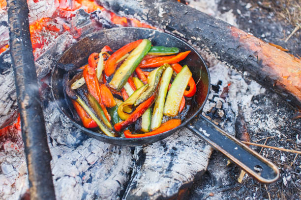 istock A dish of red bell peppers and cucumbers in a pan on a fire 1139875070