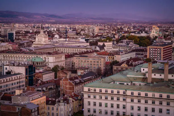 Highly detailed panoramic elevated angle view above downtown city of Sofia, Bulgaria, Eastern Europe during twilight. Including all key buildings in the heart of city centre: National Court building, Saint Nedelya church, Sheraton, Presidency, Alexander Nevski cathedral, building of old parliament, etc. Shot on Canon EOS full frame system with tilt-shift prime lens for best quality.