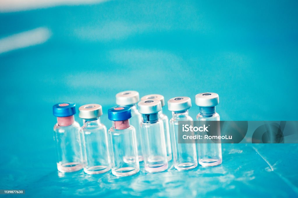 Infant and Childhood Vaccines bottles. Vaccines & Immunization concept Antibody Stock Photo