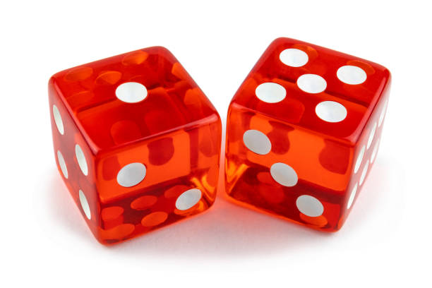 istock Two red dice isolated on a white background. One and five are so close. 1139877735