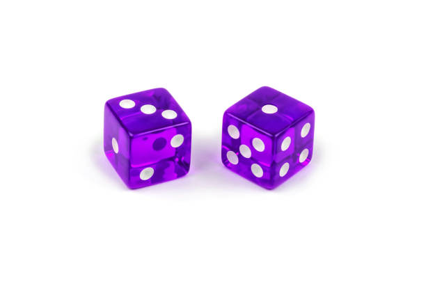 istock Two purple glass dice isolated on white background. Three and one. 1139877776