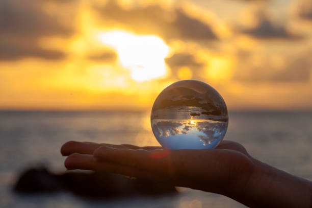 istock Crystal ball photography - sunset beach 1139878486