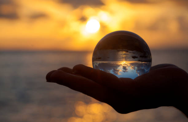 istock Crystal ball photography - sunset beach 1139878506