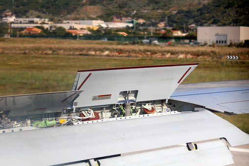 interesting image of mechanical parts of airliner wing