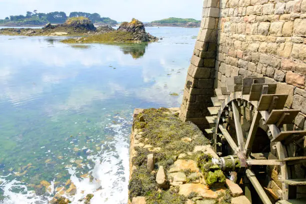 Ile de Bréhat at the Côtes d'Armor in Bretagne France during a beautiful summer day. Ile de Brehat is a popular tourist destination and a place to spend a vacation in one of the idyllic cottages.