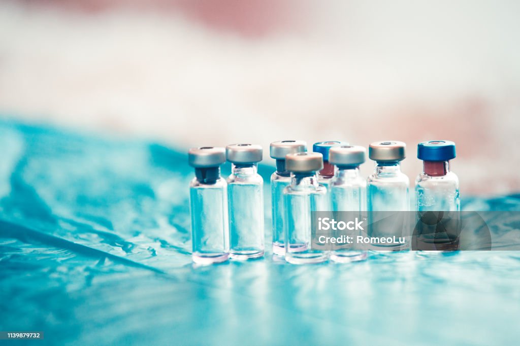 Infant and Childhood Vaccines bottles. Vaccines & Immunization concept Antibody Stock Photo