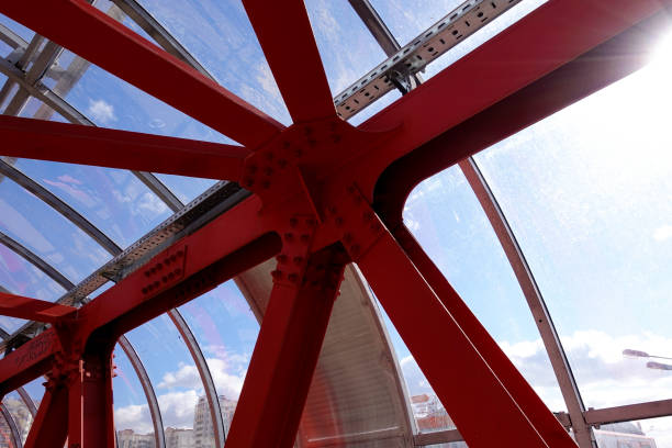 istock Overhead passage. Bolted steel beams. Painted in red. Interior. 1139880278
