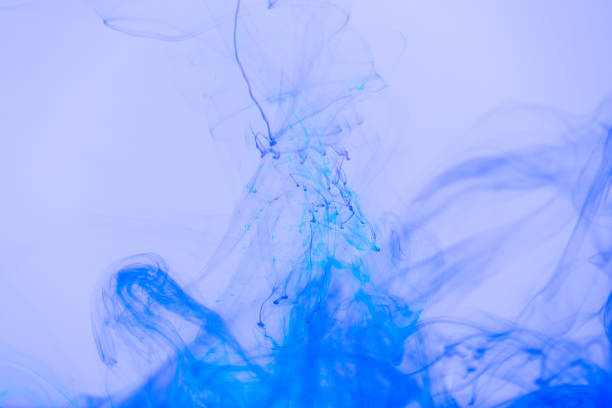istock Blue with azure colored ink spreading in the water 1139881536