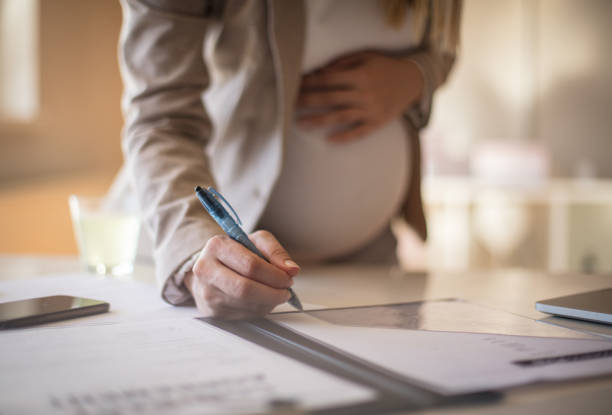 Complete all the jobs before the baby comes to the world. stock photo