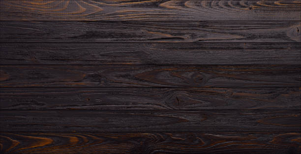 Dark wooden planks table background