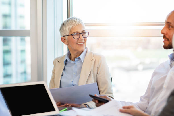 istock Team of business people discussing about new project 1139885728