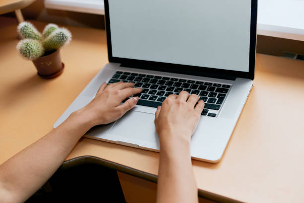 istock Woman working at home office hand on keyboard close up 1139885853