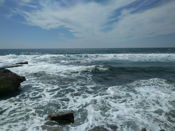 istock Seascape with small waves and blue sky. 1139886982