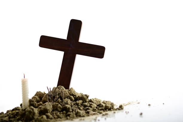 istock Jesus cross in cemetery 1139887658