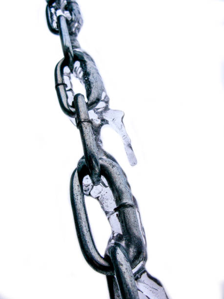 Close up of a chain that is covered with ice