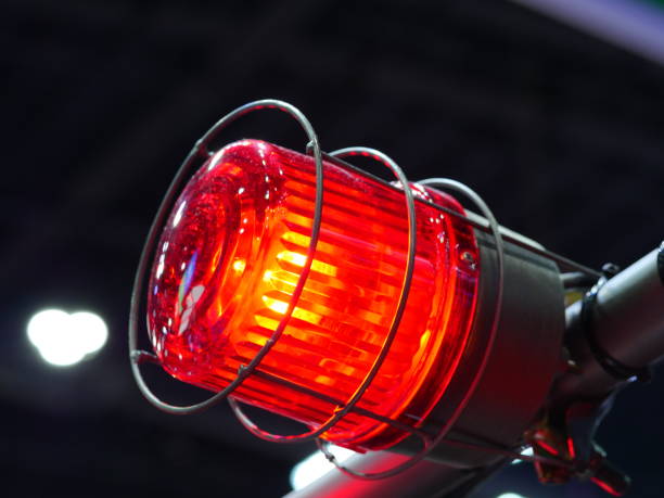 istock Red siren light in construction side on safety sign 1139890778