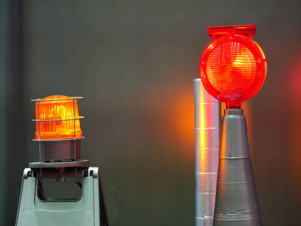 istock Red siren light in construction side on safety sign 1139890780