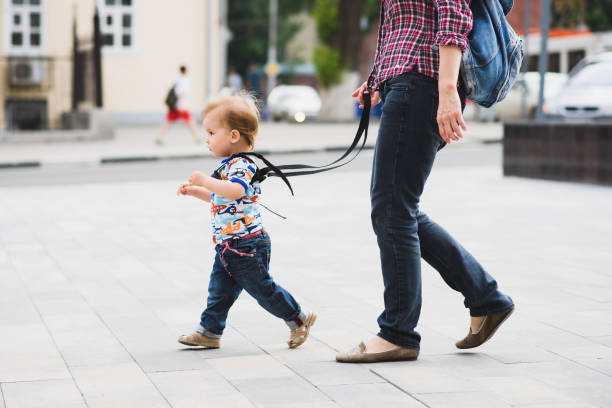 istock Mom insures her child during a walk 1139892217