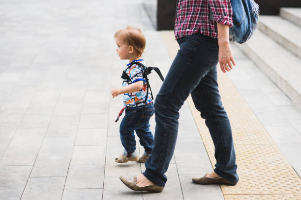istock Mom insures her child during a walk 1139892237