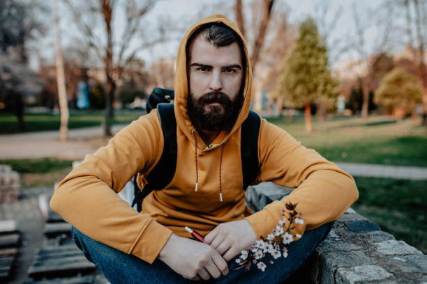 istock Handsome bearded man on a sunny spring day in the park 1139892521