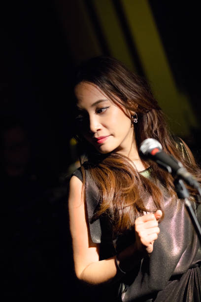 istock Peforming and singing thai jazz singer 1139895948