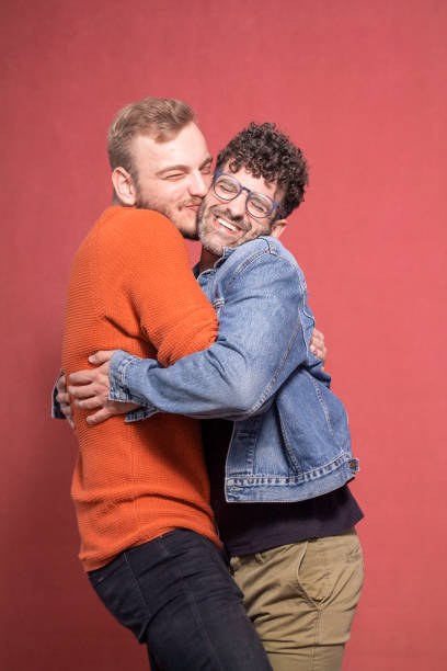 istock cutest cuddling gay couple ever. 1139897830