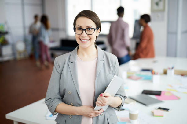 istock Modern Businesswoman Posing in Office 1139897912
