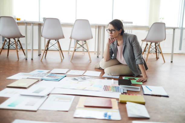 istock Businesswoman Planning Project on Floor 1139898036