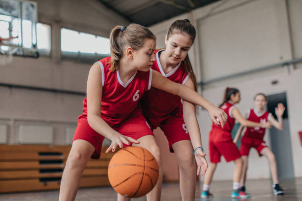 istock Girls playing basketball 1139901339