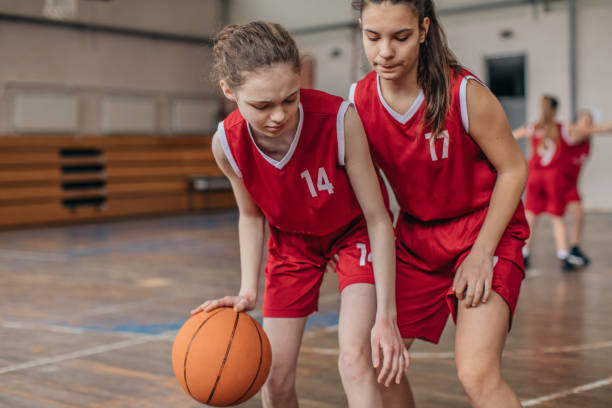 istock Young girls playing basketball 1139901369