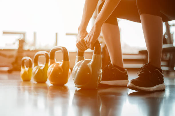 istock Exercising with a kettlebell at the gym. 1139902378
