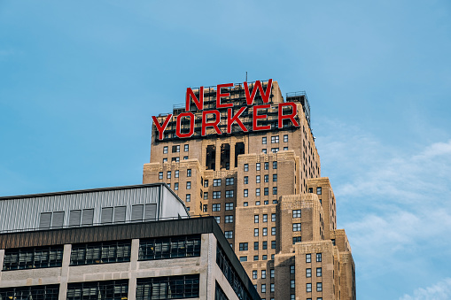 New York City - USA - Mar 14 2019: The Wyndham New Yorker Hotel is a historic hotel located at 481 Eighth Avenue in New York City, United States. The 43-story Art Deco hotel, opened 1930, is a 1,083-room, mid-priced hotel. It is located in Manhattan's Garment District and Hell's Kitchen neighborhoods, near Pennsylvania Station, Madison Square Garden, and Times Square.