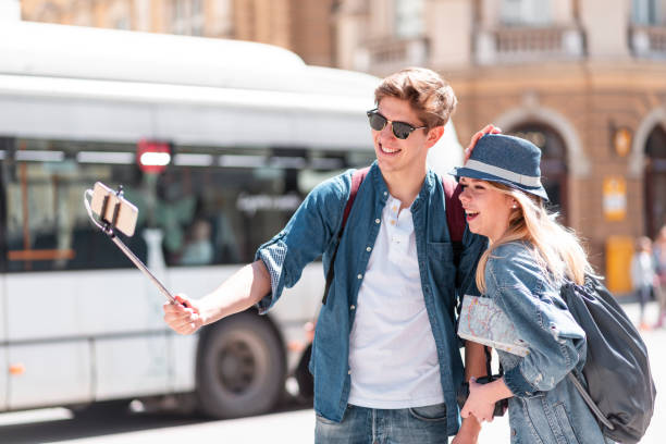 istock Happy tourists making selfie in old town 1139903920