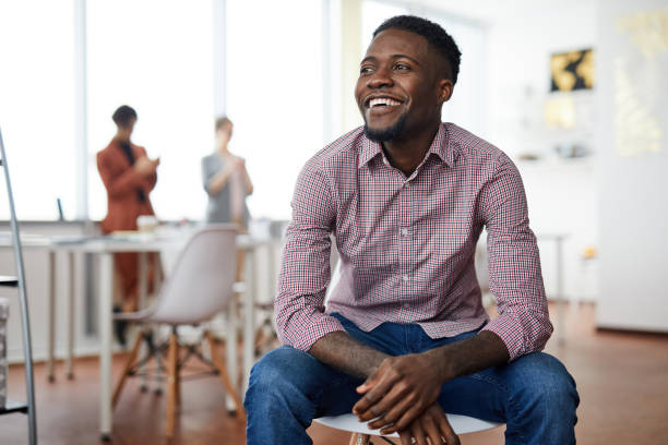 African-American Man Sitting on Chair