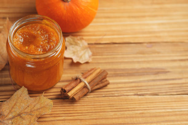 istock Homemade Pumpkin puree/jam on wooden background 1139912780