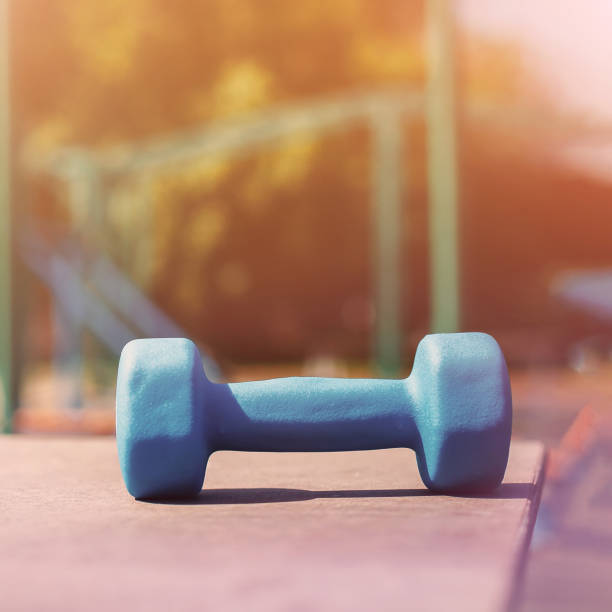 istock dumbbells on table, concept of training, sports. copy space 1139914612