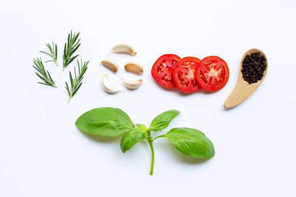 istock Various fresh vegetables and herbs on white background. Healthy eating concept 1139915720