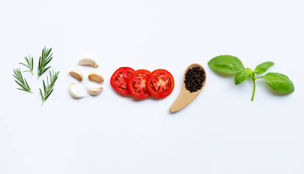 istock Various fresh vegetables and herbs on white background. Healthy eating concept 1139915729